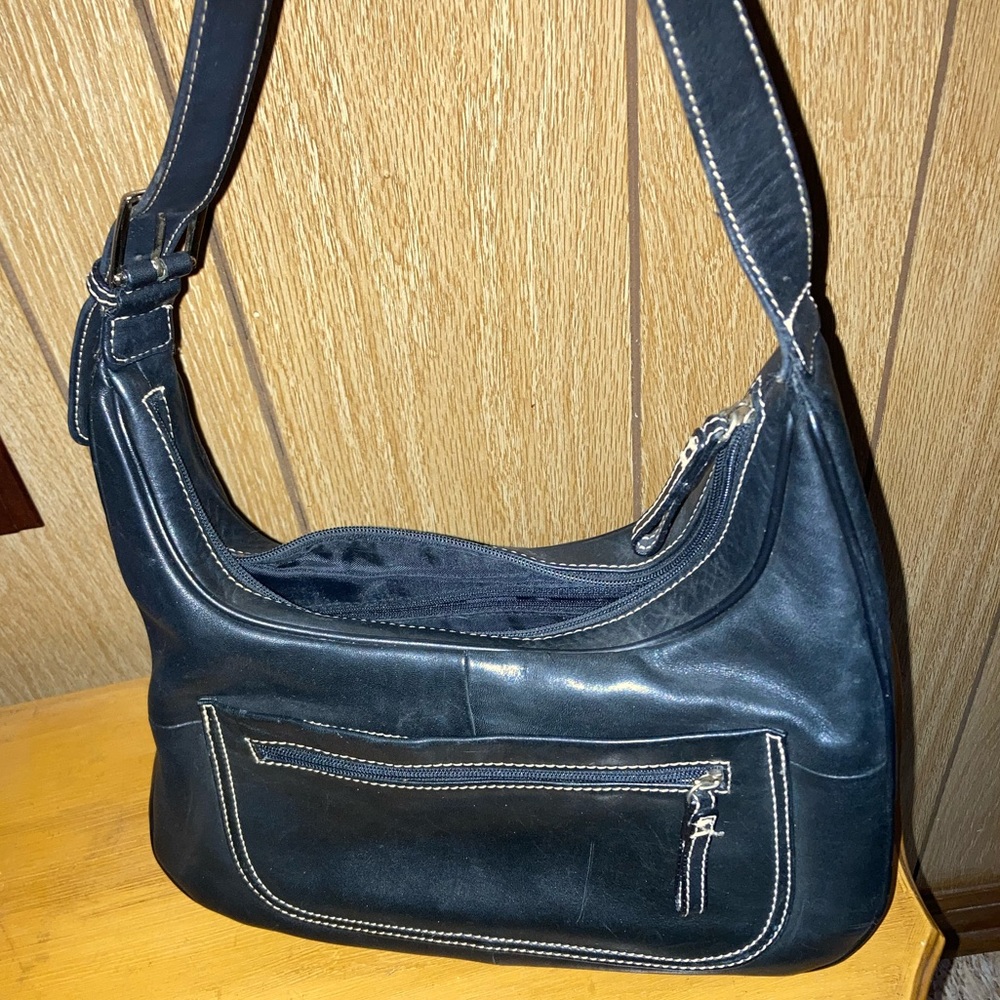 Woman’s black purse